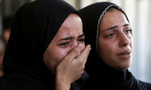 PHOTOS: People mourn Palestinians killed while seeking aid at Nasser hospital in Khan Younis