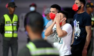 Migrants freed from El Salvador reach Venezuela in US prisoner deal