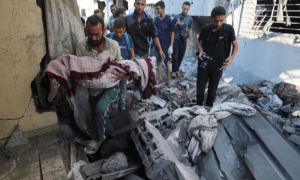 PHOTOS: Palestinians mourn in aftermath of Israeli air strike in Gaza City