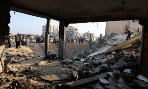 PHOTOS: Palestinians mourn in the aftermath of an overnight Israeli strike on Khan Younis