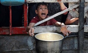 Israel kills more than 80 in Gaza as outrage over hunger crisis grows