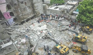 At least 10 killed as Karachi apartment building collapses