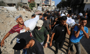 PHOTOS: Mourners react at funeral of Palestinians killed by Israeli fire while trying to receive aid
