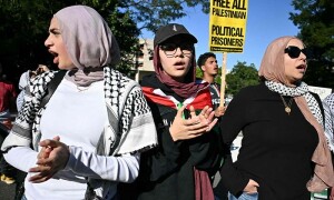 PHOTOS: People participate in the &rsquo;Break the Siege on Gaza protest outside Israeli Embassy in Washington, DC