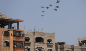 PHOTOS: Parachutes carrying aid packages airdropped over northern Gaza Strip