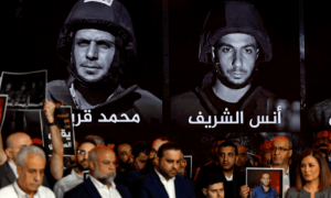 PHOTOS: Al Jazeera staff gather at network&rsquo;s studios to remember colleagues killed by Israeli strike