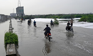 Power nearly restored, few roads blocked as Karachi receives rain for 2nd day