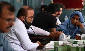 Smog then floods: Families in Punjab &lsquo;can&rsquo;t catch a break&rsquo;