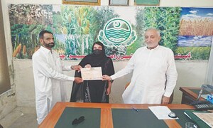 Daughter guides farmer to clinch first prize in wheat yield competition