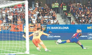 Barcelona demolish Valencia in front of small crowd