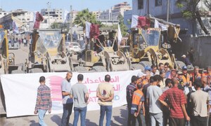 Israel cuts agreed aid flow over ‘slow release’ of bodies