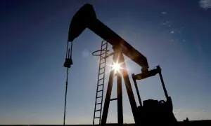Oil edges lower amid supply glut