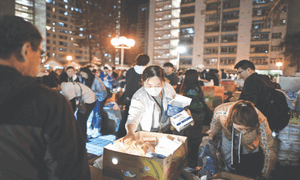 Builders arrested over Hong Kong fire as death toll hits 83