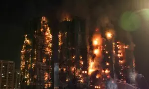 Hong Kong fire: Echoes of loss below burnt towers