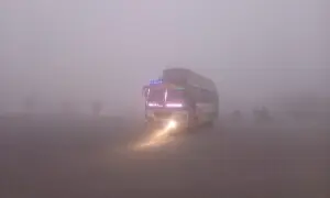 In pictures: Smog-choked Lahore struggles through another grey morning