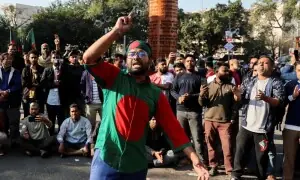 In pictures: Buildings set on fire as violent protests break out in Dhaka following death of wounded youth leader