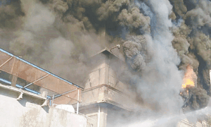 Massive blaze rips through sprawling garment factory at Landhi EPZ