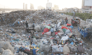 Stench, toxic gases from garbage dump along Karachi&rsquo;s Malir river plague residents, commuters