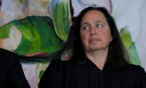 Judge blocks Trump&rsquo;s push to end legal status of migrants