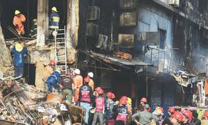 Grief gives way to anger amid search for Gul Plaza victims