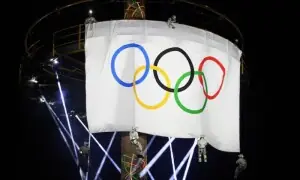 France welcomes Olympic flag as 2030 Winter Games loom