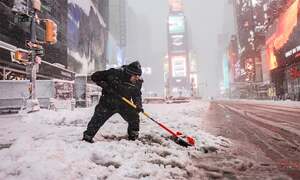 Blizzard pummels US northeast, disturbing flights and road network