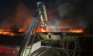 Survivors say no rescuers reached them while Gul Plaza was burning