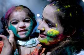 Hindu community celebrates Holi with simplicity