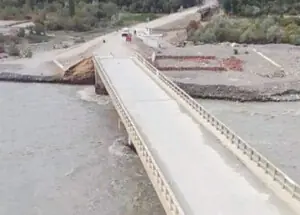 Rising water level in Yarkhun River threatens key bridge