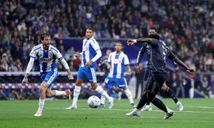 Vinicius double delays Barca title as Real down Espanyol