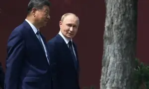 Putin trip aims to show China ties unshakeable after Trump pomp