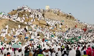 In pictures: Muslims pray on Mount Arafat as Haj reaches its peak