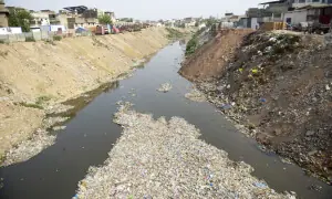 Waste dumping in Leh Nullah raises flood risk