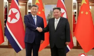 Xi vows unwavering support for Kim in rare North Korea visit