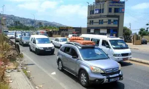 PHOTOS: Lebanese people flee city of Tyre amid Israeli evacuation orders