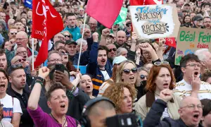 Thousands turn out for anti-racism rally after days of unrest in Belfast