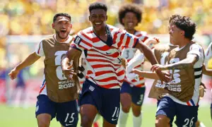 US advance to World Cup round of 32 with dominant 2-0 win over Australia