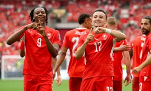 Switzerland down World Cup co-hosts Canada to top Group 'B', both progress
