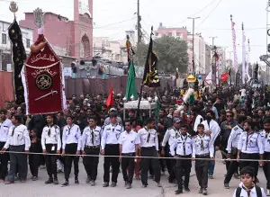 Watching like hawks, scouts guide Muharram processions with devotion in Karachi