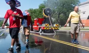 Heat wave disrupts fourth of July events across US, strains power grids