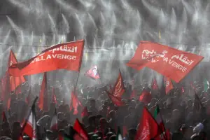 PICTURE: Mourners wave 'We will avenge' flags at Khamenei's funeral