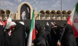 Grief, defiance on display as Tehran warns foes again