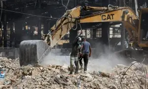 PHOTOS: Workers clear rubble of buildings destroyed in Israeli strikes in Beirut