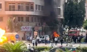 Blasts rock Damascus during French President Macron's visit