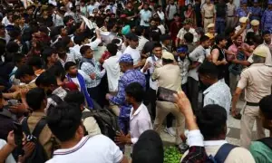 Police baton-charge supporters of India's cockroach movement as thousands gather for march on parliament