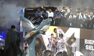 Thousands welcome home Argentina squad, without Messi, despite World Cup loss