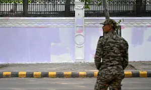 Modi announces panel to reform India's exam system; anti-govt graffiti at protest site painted over