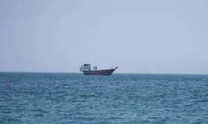 Can Iran legally charge vessels for traversing the Strait of Hormuz?