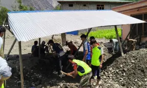 Volunteers clear debris from flood-hit Chitral villages