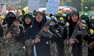PHOTOS: Iran's Basij paramilitary force stages rally in streets of Tehran
